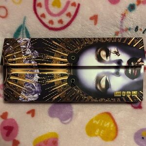 Pat McGrath Eyeshadow Palette with Gold and Purple Hues